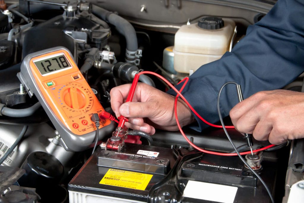 Car battery being tested