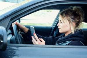 Driver looking at phone while driving