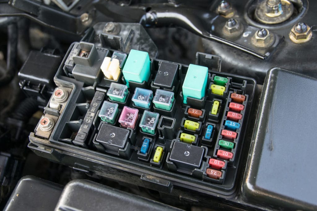 Open fuse box on a vehicle