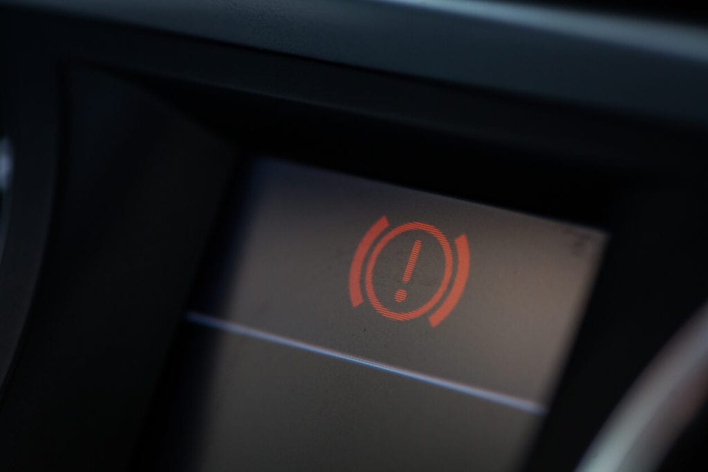Brake light indicator on car dashboard