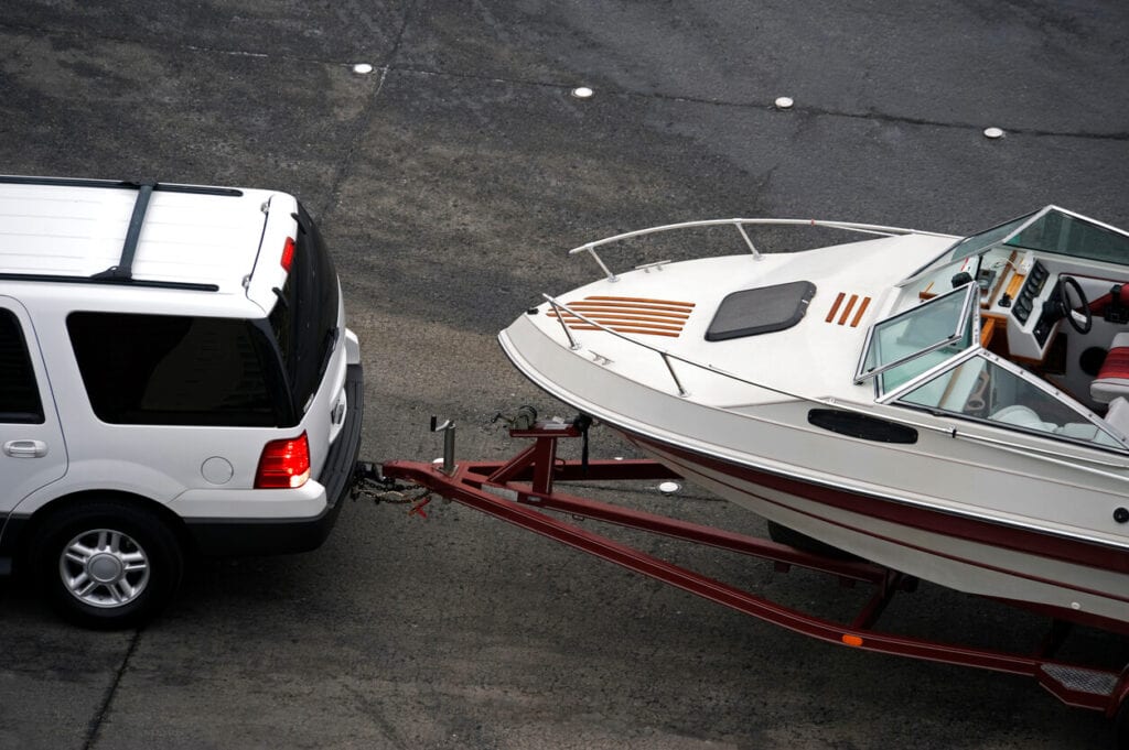 Texas Trailer Registration - Car towing boat with trailer