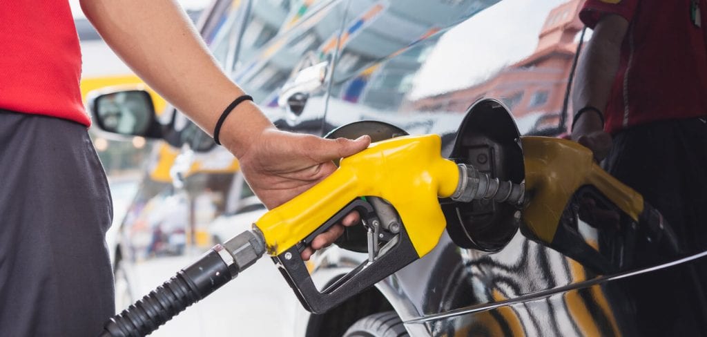 yellow gasoline handle refueling car