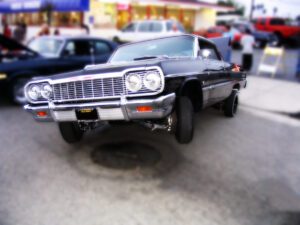 black low rider car using hydraulics