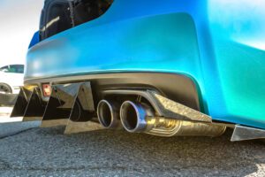 blue titanium car with dual exhaust tips