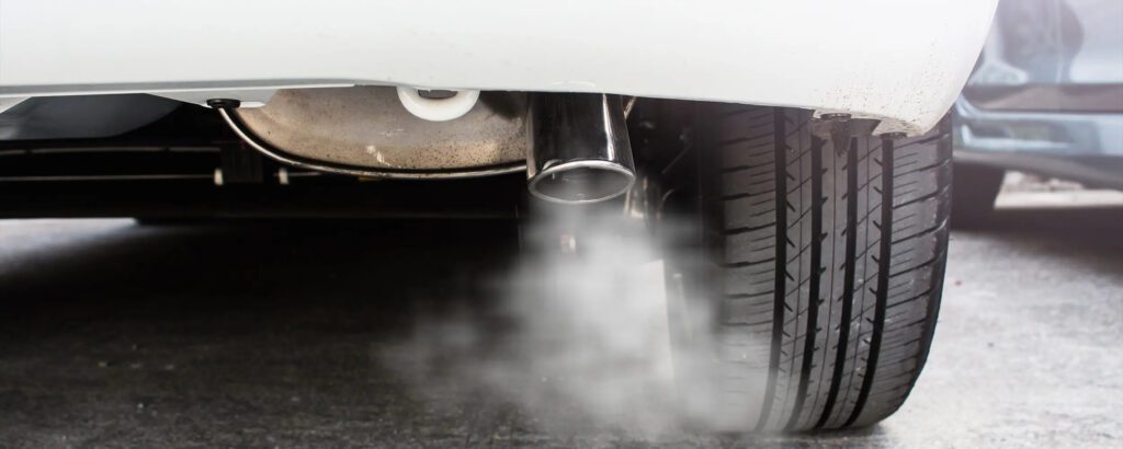 Smoke coming from a car’s exhaust pipe